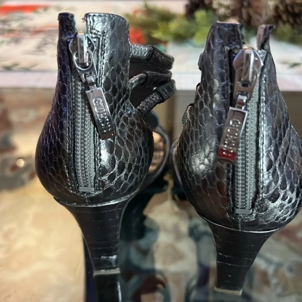 Guess heels about to 4inches, big rhinestones , bright and shiny